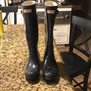 Women’s tall glossy black high hunter rain boots